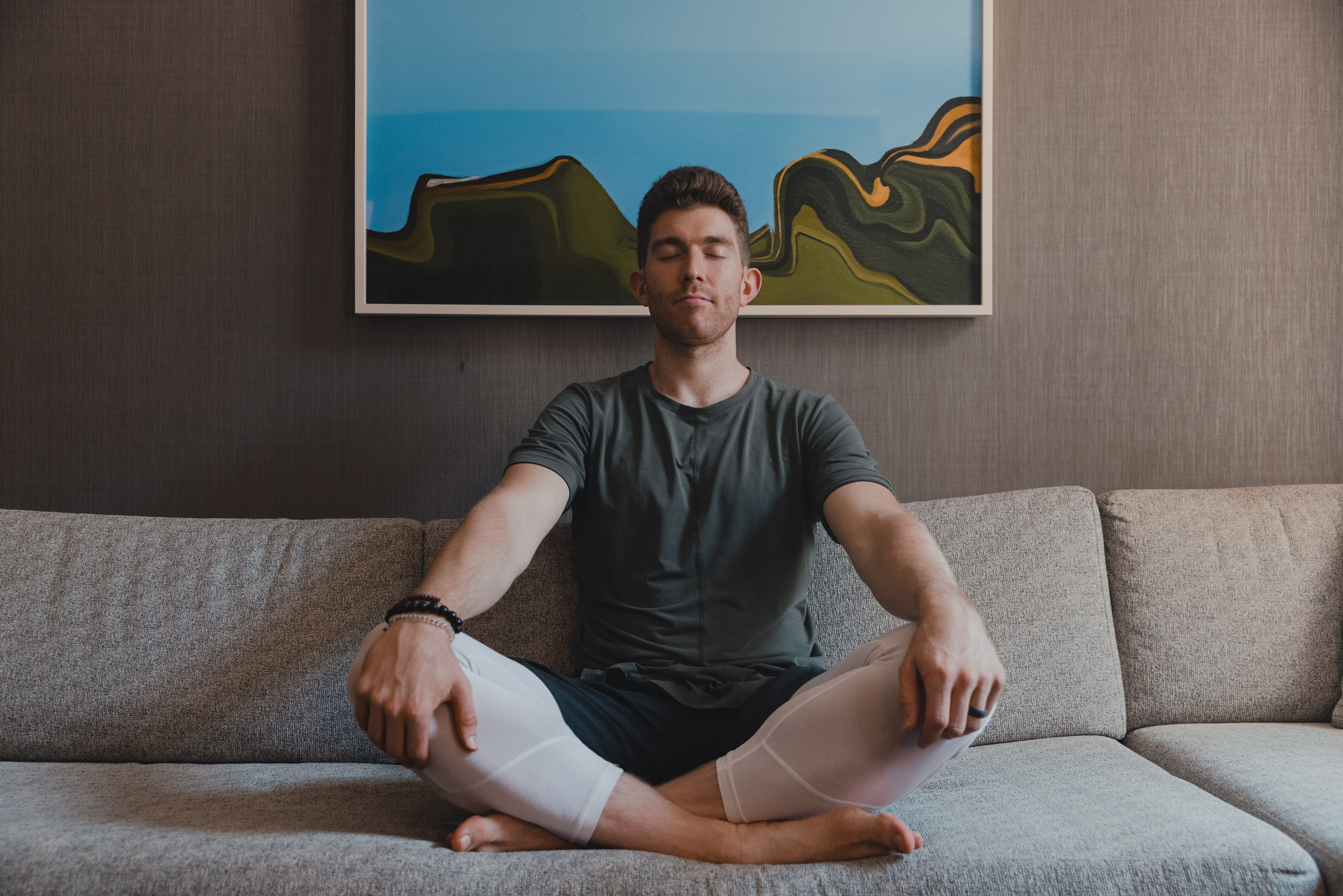 Person taking a wellness break to meditate