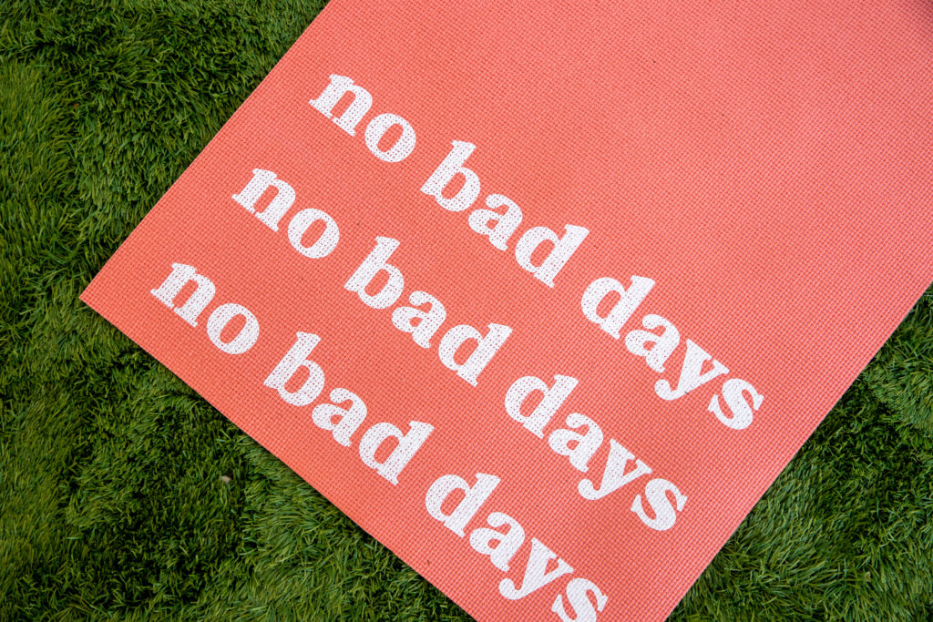 pink yoga mat that says no bad days in white letters. It is not a bad day when you are working towards the goals you have set